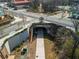 Overhead view of the Westside Beltline Connector path leading under a concrete bridge and to city streets at 1340 North Avenue Ave, Atlanta, GA 30318