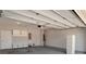 This two car garage offers plenty of storage and bright lighting at 2628 Songbird Ln, Grayson, GA 30017