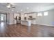Open concept kitchen with stainless steel appliances, white cabinets, recessed lighting, and a large island at 2628 Songbird Ln, Grayson, GA 30017