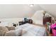 Bedroom with hardwood floors, a dark wood desk, and a comfortable bed at 2845 Hickory Cir, Snellville, GA 30078