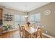 Warm dining room area with hardwood flooring, perfect for Gathering meals or entertaining guests at 2845 Hickory Cir, Snellville, GA 30078