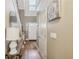 Bright foyer with hardwood floors, staircase, and stylish decor, creating a welcoming entrance at 2845 Hickory Cir, Snellville, GA 30078