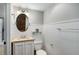 Cozy bathroom with a vanity, toilet and a glass shelf at 3240 Pinestream Nw Rd, Atlanta, GA 30327