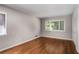 Spacious bedroom features hardwood floors and lots of natural light at 3240 Pinestream Nw Rd, Atlanta, GA 30327