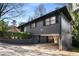 View of carport with lots of headroom and access to the backyard at 3240 Pinestream Nw Rd, Atlanta, GA 30327