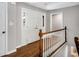 Bright foyer with hardwood floors, stairs, and a double front door at 3240 Pinestream Nw Rd, Atlanta, GA 30327