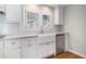 Stylish kitchen showcasing a white farm sink, stainless appliances, and subway tile backsplash at 3240 Pinestream Nw Rd, Atlanta, GA 30327