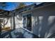 Painted deck features sliding glass doors and access to the back exterior of home at 40 Cumberland Dr, Rex, GA 30273