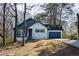 Charming exterior of a two-story home featuring complementary colors and a quaint front yard at 40 Cumberland Dr, Rex, GA 30273