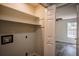 Laundry area with shelving located off the bedroom; washer hookups available at 40 Cumberland Dr, Rex, GA 30273