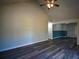 Open living space with sleek floors and neutral walls at 40 Cumberland Dr, Rex, GA 30273