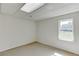 Cozy bedroom with a bright window offering natural light and outdoor views at 4840 Pisgah Rd, Cumming, GA 30028