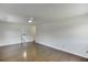 This bedroom features hardwood floors, natural light and ceiling fan and ensuite bath at 4840 Pisgah Rd, Cumming, GA 30028