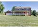 Lovely two-story brick home featuring a covered front porch, set on a generous lawn at 4840 Pisgah Rd, Cumming, GA 30028