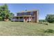 Beautiful two-story brick home with a covered porch and manicured lawn at 4840 Pisgah Rd, Cumming, GA 30028