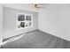 Bright and airy bedroom with a large window providing lots of natural light at 1110 Robert Pointe Way, Lawrenceville, GA 30045