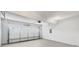 Spacious garage featuring an automatic door and ample room for parking and storage at 1110 Robert Pointe Way, Lawrenceville, GA 30045