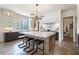 Gourmet kitchen with a large island, stainless steel appliances, modern lighting, and sleek cabinetry at 1442 Cedarhurst Dr, Dunwoody, GA 30338