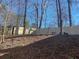 View of the backyard with a new wooden fence at 1584 Carroll Nw Dr, Atlanta, GA 30318