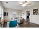 Bright and airy living room with a comfortable couch, large windows, and a stylish decor at 1584 Carroll Nw Dr, Atlanta, GA 30318