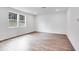 Light-filled bonus room with recessed lighting and beautiful flooring, perfect for relaxation at 205 Groveton Ct, Euharlee, GA 30145