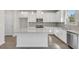 Modern kitchen featuring white cabinets, stainless steel appliances, granite countertops and wooden floors at 205 Groveton Ct, Euharlee, GA 30145