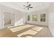 Main bedroom with tray ceilings and large windows allowing ample natural light at 2410 Glade Overlook, Cumming, GA 30041