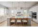 Beautiful kitchen with a large center island, pendant lights, and stainless steel appliances at 2453 Red Maple Se Xing # 118, Smyrna, GA 30080