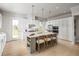 Bright kitchen featuring a large center island, modern appliances, and stylish pendant lighting at 2453 Red Maple Se Xing # 118, Smyrna, GA 30080