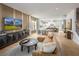 Open-concept living area seamlessly connecting the living room, dining area, and modern kitchen at 2453 Red Maple Se Xing # 118, Smyrna, GA 30080