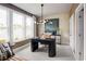 Bright and modern office space featuring large windows, stylish lighting, and a comfortable seating area at 2453 Red Maple Se Xing # 118, Smyrna, GA 30080