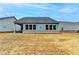 Expansive backyard featuring a well-maintained lawn, ideal for relaxation and outdoor gatherings at 811 Pineberry Ct, Grayson, GA 30017