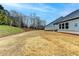 Beautiful backyard with plenty of space for gardening, playing, or simply enjoying the outdoors at 811 Pineberry Ct, Grayson, GA 30017