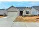 Charming single-story home with a well-manicured lawn and a two-car garage, offering comfortable suburban living at 811 Pineberry Ct, Grayson, GA 30017