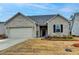 Charming single-story home with a well-manicured lawn and a two-car garage, offering comfortable suburban living at 811 Pineberry Ct, Grayson, GA 30017