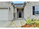 Inviting entryway with elegant brickwork and a stylish black front door at 811 Pineberry Ct, Grayson, GA 30017