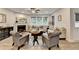 Comfortable living room with a fireplace, neutral tones, and ample seating for entertaining at 811 Pineberry Ct, Grayson, GA 30017