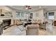 Bright and inviting living room with fireplace and large windows offering natural light at 811 Pineberry Ct, Grayson, GA 30017