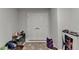Large storage room featuring double doors and neutral paint at 811 Pineberry Ct, Grayson, GA 30017