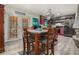 Eat-in kitchen with a table and stainless steel appliances at 989 Queen Elizabeth Way, Morrow, GA 30260