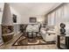 Cozy living room with hardwood floors, a fireplace and plush seating at 989 Queen Elizabeth Way, Morrow, GA 30260