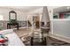 Open-concept living room showcasing a fireplace and hardwood floors at 989 Queen Elizabeth Way, Morrow, GA 30260
