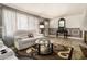 Inviting living room featuring hardwood floors and comfortable seating at 989 Queen Elizabeth Way, Morrow, GA 30260