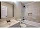 Bathroom featuring a shower and tub, and a sink with a vanity and a large mirror at 11 Grove Ln, Hampton, GA 30228
