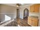 Charming dining room featuring hardwood floors, neutral colors, and open access to other living spaces at 11 Grove Ln, Hampton, GA 30228