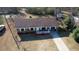 Aerial view of a single-Gathering home featuring mature trees and front yard driveway at 11 Grove Ln, Hampton, GA 30228