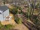 Aerial view of home with treed backyard and wooden deck at 2150 Essex Sw Ave, Atlanta, GA 30311
