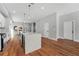 Bright, open kitchen with a large center island, stainless steel appliances, and modern finishes at 2150 Essex Sw Ave, Atlanta, GA 30311