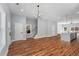 Bright and airy living space with hardwood flooring, modern lighting and an open floor plan at 2150 Essex Sw Ave, Atlanta, GA 30311
