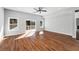 Spacious living room with hardwood floors, sliding door access to patio, and plenty of natural light at 2150 Essex Sw Ave, Atlanta, GA 30311
